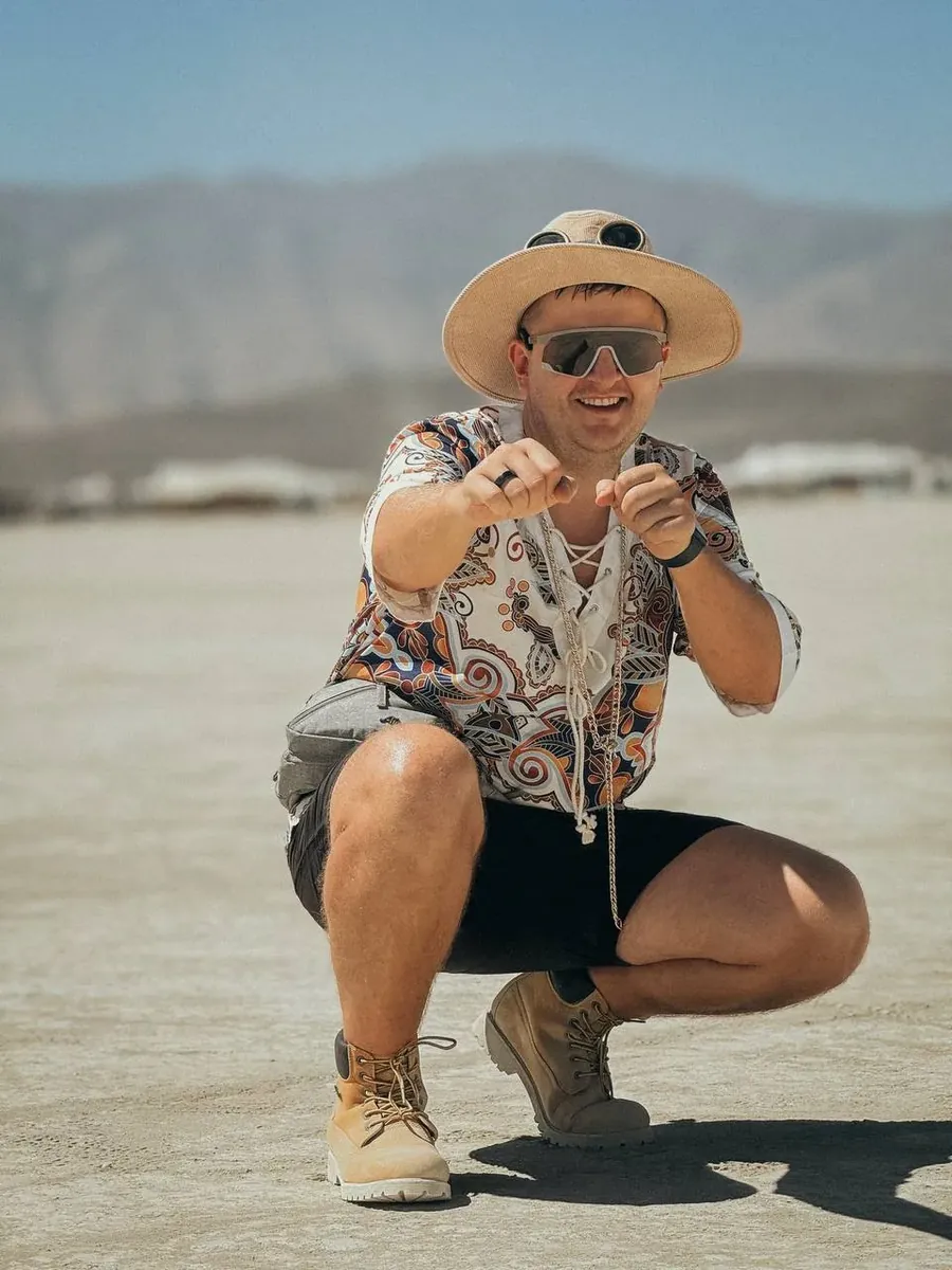 Ilya Prusenko crouching in the desert